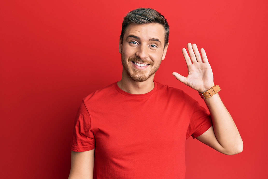 AdobeStock_423262918_man_waving_1110x740